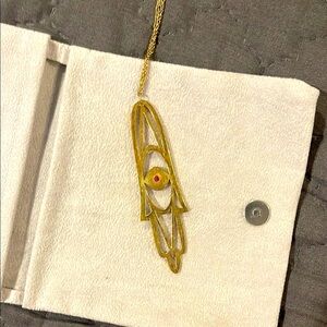 Jennifer Zeuner Gold Hamsa Necklace with Red Gemstone